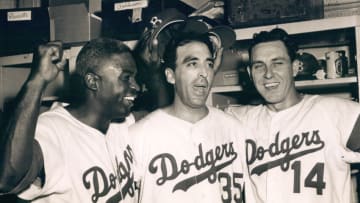 UNSPECIFIED - UNDATED: Jackie Robinson, Sal Maglie and Gil Hodges celebrate another Brooklyn Dogders Victory (Sports Studio Photos/Getty Images)