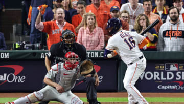 HOUSTON, TEXAS - OCTOBER 28: Aledmys Diaz #16 of the Houston Astros is hit by a pitch during the tenth inning in Game One of the 2022 World Series at Minute Maid Park on October 28, 2022 in Houston, Texas. Home plate umpire James Hoye ruled that Diaz deliberately leaned into the pitch. (Photo by Bob Levey/Getty Images)
