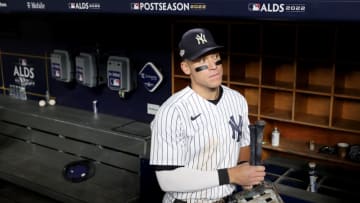 NEW YORK, NEW YORK - OCTOBER 18: Aaron Judge #99 of the New York Yankees looks on after defeating the Cleveland Guardians in game five of the American League Division Series at Yankee Stadium on October 18, 2022 in New York, New York. (Photo by Elsa/Getty Images)