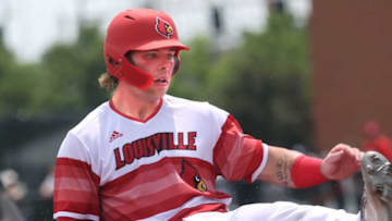 Louisville’s Dalton Rushing slides into third safely against Virginia in the last game of the regular season.May 21, 2022Louisville 25