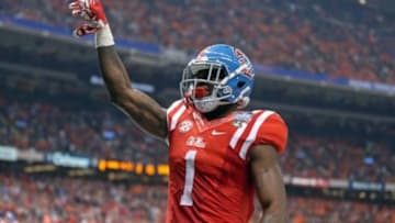 Jan 1, 2016; New Orleans, LA, USA; Mississippi Rebels wide receiver Laquon Treadwell (1) celebrates his ten-yard touchdown catch against the Oklahoma State Cowboys in the second quarter of the 2016 Sugar Bowl at the Mercedes-Benz Superdome. Mandatory Credit: Chuck Cook-USA TODAY Sports