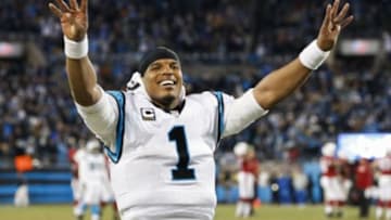 Jan 24, 2016; Charlotte, NC, USA; Carolina Panthers quarterback Cam Newton (1) signals the fourth quarter in the NFC Championship football game against the Arizona Cardinals at Bank of America Stadium. Mandatory Credit: Jason Getz-USA TODAY Sports