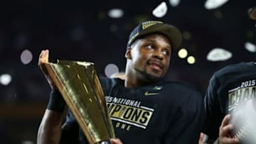 Jan 11, 2016; Glendale, AZ, USA; Alabama Crimson Tide linebacker Reggie Ragland celebrates with the CFP trophy following the game against the Clemson Tigers in the 2016 CFP National Championship at University of Phoenix Stadium. Mandatory Credit: Mark J. Rebilas-USA TODAY Sports