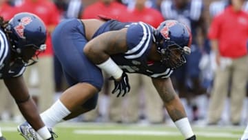 Sep 13, 2014; Oxford, MS, USA; Mississippi Rebels defensive tackle Robert Nkemdiche (5) steps up to the line during the game against the Louisiana-Lafayette Ragin Cajuns at Vaught-Hemingway Stadium. Mandatory Credit: Spruce Derden-USA TODAY Sports