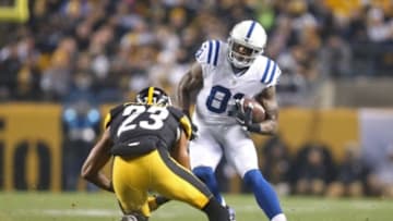 Dec 6, 2015; Pittsburgh, PA, USA; Indianapolis Colts wide receiver Andre Johnson (81) runs after a pass reception against Pittsburgh Steelers free safety Mike Mitchell (23) during the second quarter at Heinz Field. Mandatory Credit: Charles LeClaire-USA TODAY Sports