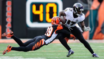 Jan 3, 2016; Cincinnati, OH, USA; Baltimore Ravens wide receiver Jeremy Butler (17) carries the ball as Cincinnati Bengals strong safety Leon Hall (29) defends during the second quarter at Paul Brown Stadium. Mandatory Credit: Joshua Lindsey-USA TODAY Sports