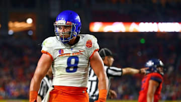 Dec 31, 2014; Glendale, AZ, USA; Boise State Broncos defensive lineman Kamalei Correa (8) celebrates in the closing seconds of the game against the Arizona Wildcats in the 2014 Fiesta Bowl at Phoenix Stadium. The Broncos defeated the Wildcats 38-30. Mandatory Credit: Mark J. Rebilas-USA TODAY Sports