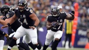 Dec 27, 2015; Baltimore, MD, USA; Baltimore Ravens running back Terrance West (27) runs during the first quarter against the Pittsburgh Steelers at M&T Bank Stadium. Baltimore Ravens defeated Pittsburgh Steelers 20-17. Mandatory Credit: Tommy Gilligan-USA TODAY Sports