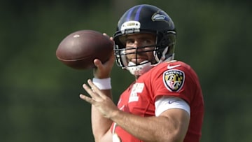 Jul 31, 2016; Owings Mills, MD, USA; Baltimore Ravens quarterback Joe Flacco (5) throws during the morning session of training camp at Under Armour Performance Center. Mandatory Credit: Tommy Gilligan-USA TODAY Sports