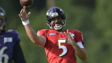 Jul 31, 2016; Owings Mills, MD, USA; Baltimore Ravens quarterback Joe Flacco (5) throws during the morning session of training camp at Under Armour Performance Center. Mandatory Credit: Tommy Gilligan-USA TODAY Sports