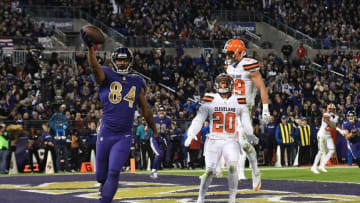 Nov 10, 2016; Baltimore, MD, USA; Baltimore Ravens wide receiver Chris Matthews (84) celebrates after scoring a touchdown in front of Cleveland Browns cornerback Briean Boddy-Calhoun (20) during the third quarter at M&T Bank Stadium. Mandatory Credit: Tommy Gilligan-USA TODAY Sports