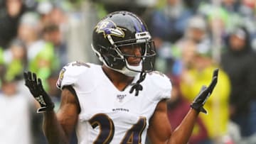SEATTLE, WASHINGTON - OCTOBER 20: Cornerback Marcus Peters #24 of the Baltimore Ravens reacts against the the Seattle Seahawks in the first quarter of the game at CenturyLink Field on October 20, 2019 in Seattle, Washington. (Photo by Abbie Parr/Getty Images)