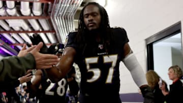 BALTIMORE, MARYLAND - DECEMBER 01: Josh Bynes #57 of the Baltimore Ravens greets fans as he prepares to take the field against the San Francisco 49ers at M&T Bank Stadium on December 01, 2019 in Baltimore, Maryland. (Photo by Rob Carr/Getty Images)