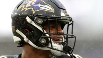 BALTIMORE, MARYLAND - DECEMBER 01: Lamar Jackson #8 of the Baltimore Ravens celebrates against the San Francisco 49ers after throwing a first quarter touchdown pass at M&T Bank Stadium on December 01, 2019 in Baltimore, Maryland. (Photo by Rob Carr/Getty Images)