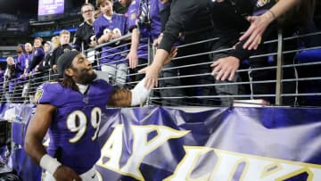 BALTIMORE, MARYLAND - JANUARY 11: Matthew Judon #99 of the Baltimore Ravens high fives fans after the AFC Divisional Playoff game against the Tennessee Titans at M&T Bank Stadium on January 11, 2020 in Baltimore, Maryland. (Photo by Maddie Meyer/Getty Images)