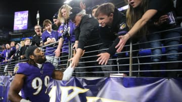 BALTIMORE, MARYLAND - JANUARY 11: Matt Judon #99 of the Baltimore Ravens with fans after the AFC Divisional Playoff game against the Tennessee Titans at M&T Bank Stadium on January 11, 2020 in Baltimore, Maryland. (Photo by Maddie Meyer/Getty Images)