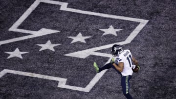 EAST RUTHERFORD, NJ - FEBRUARY 02: Wide receiver Percy Harvin #11 of the Seattle Seahawks runs for 30 yards during Super Bowl XLVIII at MetLife Stadium against the Denver Broncos on February 2, 2014 in East Rutherford, New Jersey. (Photo by Win McNamee/Getty Images)