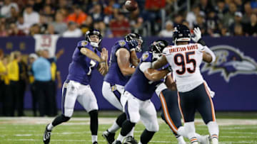 CANTON, OH - AUGUST 02: Josh Woodrum #7 of the Baltimore Ravens throws a pass in the second quarter of the Hall of Fame Game against the Chicago Bears at Tom Benson Hall of Fame Stadium on August 2, 2018 in Canton, Ohio. (Photo by Joe Robbins/Getty Images)