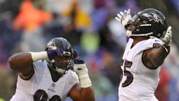 Brandon Williams #98 and Terrell Suggs #55 of the Baltimore Ravens (Photo by Patrick Smith/Getty Images)