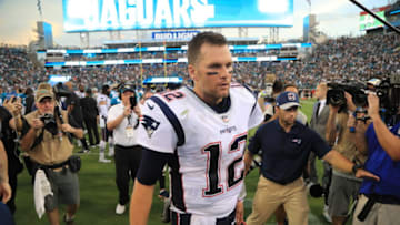 JACKSONVILLE, FL - SEPTEMBER 16: Tom Brady #12 of the New England Patriots walks off the field following the New England Patriots 31-20 loss to the Jacksonville Jaguars at TIAA Bank Field on September 16, 2018 in Jacksonville, Florida. (Photo by Sam Greenwood/Getty Images)