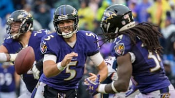 BALTIMORE, MD - SEPTEMBER 23: Joe Flacco #5 of the Baltimore Ravens pitches to Alex Collins #34 as Derek Wolfe #95 of the Denver Broncos pursues during the second half at M&T Bank Stadium on September 23, 2018 in Baltimore, Maryland. (Photo by Scott Taetsch/Getty Images)