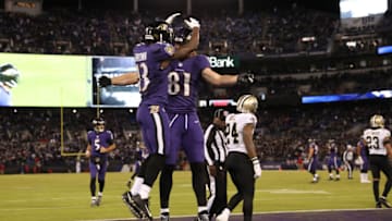 BALTIMORE, MD - OCTOBER 21: Wide Receiver John Brown #13 of the Baltimore Ravens celebrates with tight end Hayden Hurst #81after a touchdown in the fourth quarter against the New Orleans Saints at M&T Bank Stadium on October 21, 2018 in Baltimore, Maryland. (Photo by Patrick Smith/Getty Images)