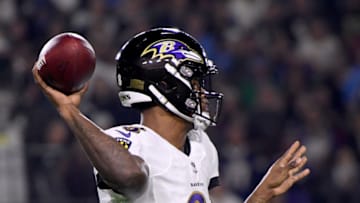 CARSON, CALIFORNIA - DECEMBER 22: Lamar Jackson #8 of the Baltimore Ravens makes a pass during the first quarter in a 22-10 win over the Los Angeles Chargers at StubHub Center on December 22, 2018 in Carson, California. (Photo by Harry How/Getty Images)