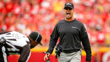 KANSAS CITY, MO - SEPTEMBER 22: Head coach John Harbaugh of the Baltimore Ravens shouts at side judge Jabir Walker after a personal foul penalty on the Ravens during the game against the Kansas City Chiefs at Arrowhead Stadium on September 22, 2019 in Kansas City, Missouri. (Photo by David Eulitt/Getty Images)