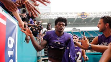 MIAMI, FLORIDA - SEPTEMBER 08: Lamar Jackson #8 of the Baltimore Ravens high fives fans after the game against the Miami Dolphins at Hard Rock Stadium on September 08, 2019 in Miami, Florida. (Photo by Michael Reaves/Getty Images)