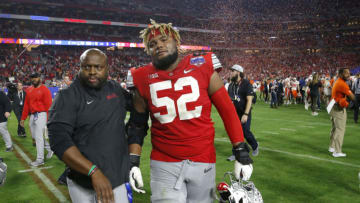 GLENDALE, ARIZONA - DECEMBER 28: Offensive lineman Wyatt Davis #52 of the Ohio State Buckeyes walks off the field after his teams 29-23 loss to the Clemson Tigers in the College Football Playoff Semifinal at the PlayStation Fiesta Bowl at State Farm Stadium on December 28, 2019 in Glendale, Arizona. (Photo by Ralph Freso/Getty Images)