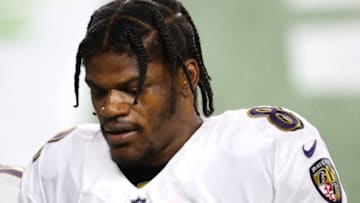 FOXBOROUGH, MASSACHUSETTS - NOVEMBER 15: Lamar Jackson #8 of the Baltimore Ravens walks to the locker room during half time of the game against the New England Patriots at Gillette Stadium on November 15, 2020 in Foxborough, Massachusetts. (Photo by Maddie Meyer/Getty Images)