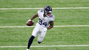 INDIANAPOLIS, INDIANA - NOVEMBER 29: Corey Davis #84 of the Tennessee Titans runs the ball against the Indianapolis Colts at Lucas Oil Stadium on November 29, 2020 in Indianapolis, Indiana. (Photo by Andy Lyons/Getty Images)