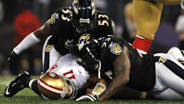 BALTIMORE - NOVEMBER 24: Jameel McClain #53 and Terrell Suggs #55 of the Baltimore Ravens sack Alex Smith #11 of the San Francisco 49ers at M&T Bank Stadium on November 24, 2011 in Baltimore, Maryland. (Photo by Larry French/Getty Images)