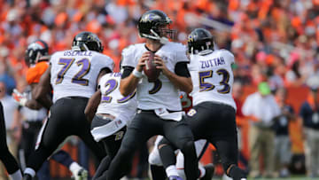 DENVER, CO - SEPTEMBER 13: Quarterback Joe Flacco #5 of the Baltimore Ravens looks to pass against the Denver Broncos in the second quarter of a game at Sports Authority Field at Mile High on September 13, 2015 in Denver, Colorado. (Photo by Doug Pensinger/Getty Images)