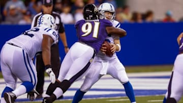 INDIANAPOLIS, IN - AUGUST 20: Matt Judon #91 of the Baltimore Ravens makes the sack on Scott Tolzien #16 of the Indianapolis Colts at Lucas Oil Stadium on August 20, 2016 in Indianapolis, Indiana. (Photo by Michael Hickey/Getty Images)