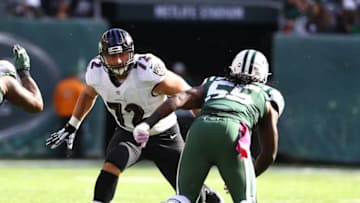 EAST RUTHERFORD, NJ - OCTOBER 23: Alex Lewis #72 of the Baltimore Ravens plays against Lorenzo Mauldin #55 of the New York Jets during their game at MetLife Stadium on October 23, 2016 in East Rutherford, New Jersey. (Photo by Al Bello/Getty Images)