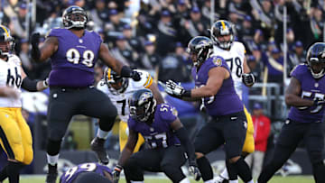 BALTIMORE, MD - NOVEMBER 6: Nose tackle Brandon Williams #98 of the Baltimore Ravens celebrates after teammate defensive end Timmy Jernigan #99 intercepts the ball in the third quarter against the Pittsburgh Steelers at M&T Bank Stadium on November 6, 2016 in Baltimore, Maryland. (Photo by Patrick Smith/Getty Images)