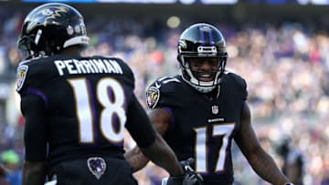 BALTIMORE, MD - NOVEMBER 27: Wide receiver Breshad Perriman #18 of the Baltimore Ravens celebrates with teammate wide receiver Mike Wallace #17 after scoring a first quarter touchdown against the Cincinnati Bengals at M&T Bank Stadium on November 27, 2016 in Baltimore, Maryland. (Photo by Patrick Smith/Getty Images)