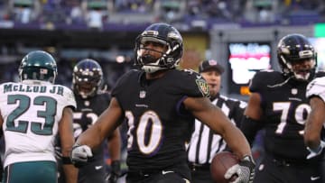BALTIMORE, MD - DECEMBER 18: Running back Kenneth Dixon #30 of the Baltimore Ravens celebrates after scoring a fourth quarter touchdown against the Philadelphia Eagles at M&T Bank Stadium on December 18, 2016 in Baltimore, Maryland. (Photo by Patrick Smith/Getty Images)