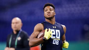 INDIANAPOLIS, IN - MARCH 06: Defensive back Marlon Humphrey of Alabama runs with the ball as a coach looks on during day six of the NFL Combine at Lucas Oil Stadium on March 6, 2017 in Indianapolis, Indiana. (Photo by Joe Robbins/Getty Images)