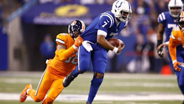 INDIANAPOLIS, IN - DECEMBER 14: Jacoby Brissett #7 of the Indianapolis Colts is tackled by Shane Ray #56 of the Denver Broncos during the first half at Lucas Oil Stadium on December 14, 2017 in Indianapolis, Indiana. (Photo by Andy Lyons/Getty Images)