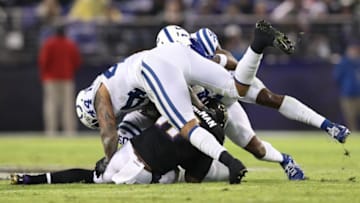 BALTIMORE, MD - DECEMBER 23: Wide Receiver Breshad Perriman #11 of the Baltimore Ravens is tackled after a catch by inside linebacker Antonio Morrison #44 of the Indianapolis Colts in the third quarter at M&T Bank Stadium on December 23, 2017 in Baltimore, Maryland. (Photo by Patrick Smith/Getty Images)