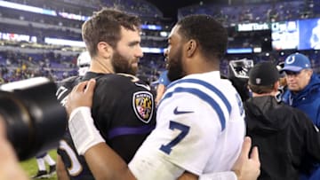 BALTIMORE, MD - DECEMBER 23: Quarterback Joe Flacco #5 of the Baltimore Ravens and quarterback Jacoby Brissett #7 of the Indianapolis Colts hug after the Baltimore Ravens 23-16 win over the Indianapolis Colts at M&T Bank Stadium on December 23, 2017 in Baltimore, Maryland. (Photo by Rob Carr/Getty Images)