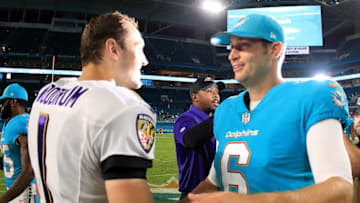 MIAMI GARDENS, FL - AUGUST 17: Jay Cutler #6 of the Miami Dolphins and Josh Woodrum #1 of the Baltimore Ravens shake hands following a preseason game at Hard Rock Stadium on August 17, 2017 in Miami Gardens, Florida. (Photo by Mike Ehrmann/Getty Images)