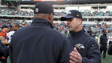 CINCINNATI, OH - JANUARY 3: Head Coach Marvin Lewis of the Cincinnati Bengals is congratulated by Head Coach John Harbaugh of the Baltimore Ravens after defeating Baltimore 24-16 at Paul Brown Stadium on January 3, 2016 in Cincinnati, Ohio. (Photo by John Grieshop/Getty Images)