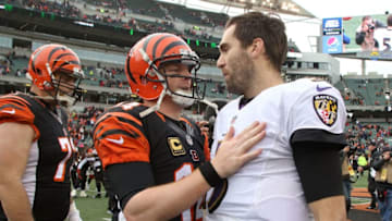 CINCINNATI, OH - JANUARY 1: Andy Dalton #14 of the Cincinnati Bengals congratulates Joe Flacco #5 of the Baltimore Ravens at the end of the game at Paul Brown Stadium on January 1, 2017 in Cincinnati, Ohio. Cincinnati defeated Baltimore 27-10. (Photo by John Grieshop/Getty Images)