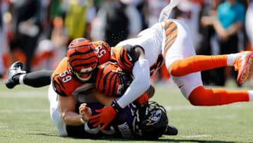 CINCINNATI, OH - SEPTEMBER 10: Nick Vigil #59 of the Cincinnati Bengals and George Iloka #43 of the Cincinnati Bengals combine to tackle Danny Woodhead #39 of the Baltimore Ravens during the first quarter at Paul Brown Stadium on September 10, 2017 in Cincinnati, Ohio. (Photo by Michael Reaves/Getty Images)