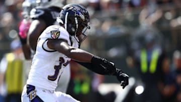 OAKLAND, CA - OCTOBER 08: Javorius Allen #37 of the Baltimore Ravens celebrates after a touchdown against the Oakland Raiders during their NFL game at Oakland-Alameda County Coliseum on October 8, 2017 in Oakland, California. (Photo by Ezra Shaw/Getty Images)