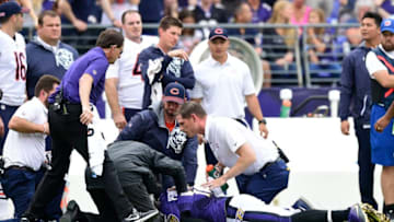 BALTIMORE, MD - OCTOBER 15: Medical Staff look at wide receiver Breshad Perriman