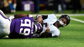 MINNEAPOLIS, MN - OCTOBER 22: Danielle Hunter #99 of the Minnesota Vikings sacks quarterback Joe Flacco #5 of the Baltimore Ravens in the first quarter of the game on October 22, 2017 at U.S. Bank Stadium in Minneapolis, Minnesota. (Photo by Hannah Foslien/Getty Images)